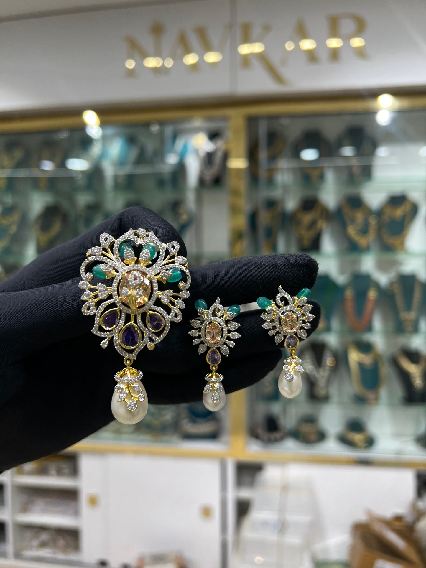 Pendant and earrings