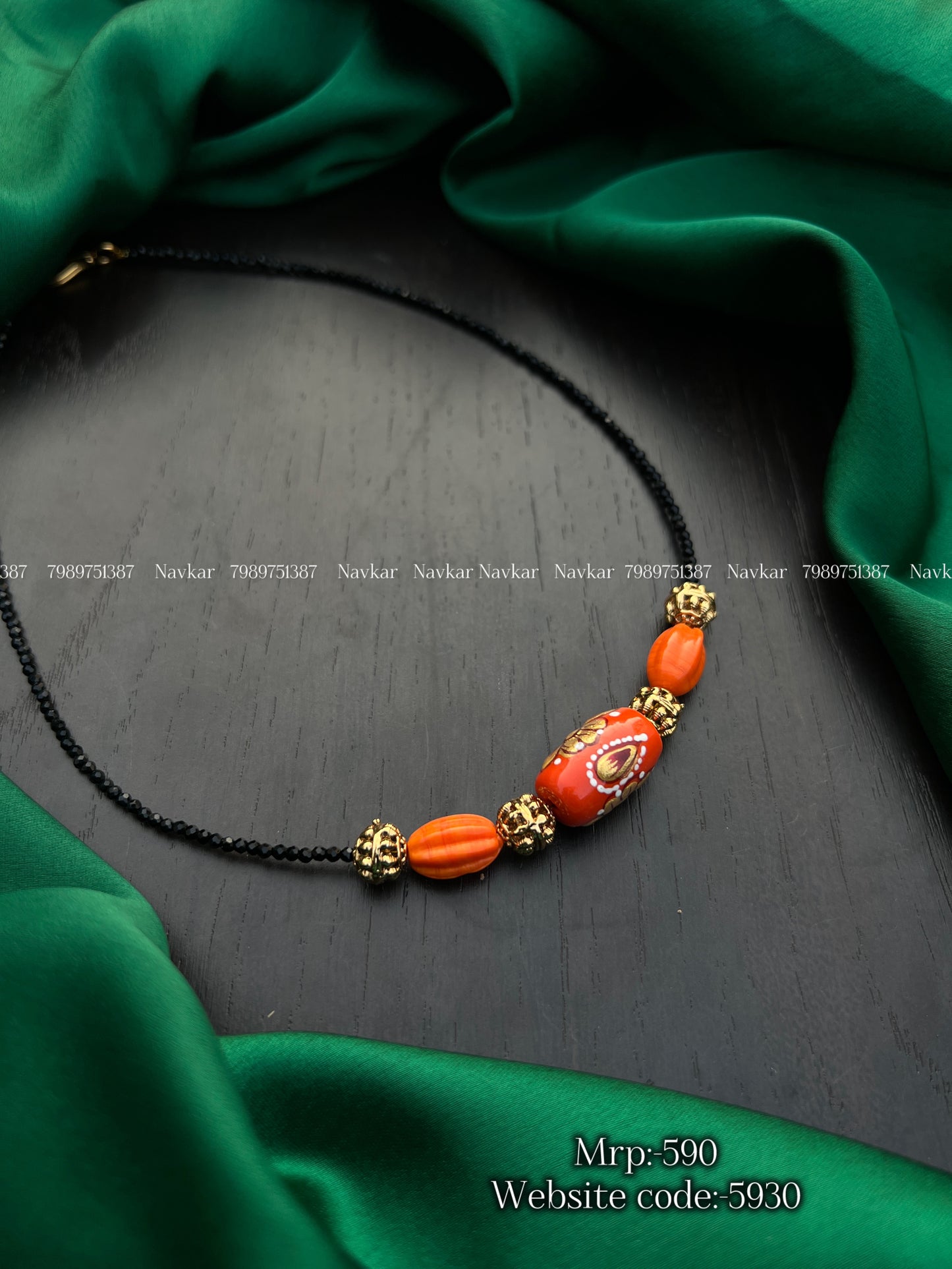 Coral black bead
