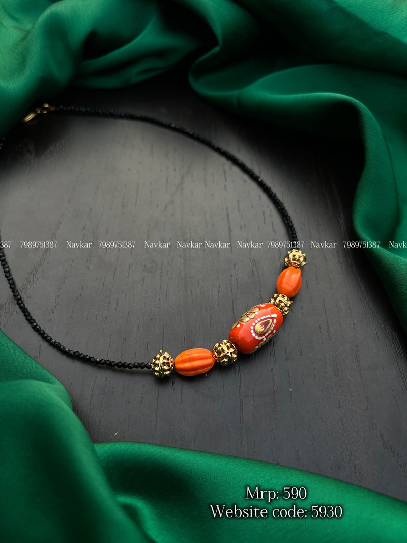 Coral black bead